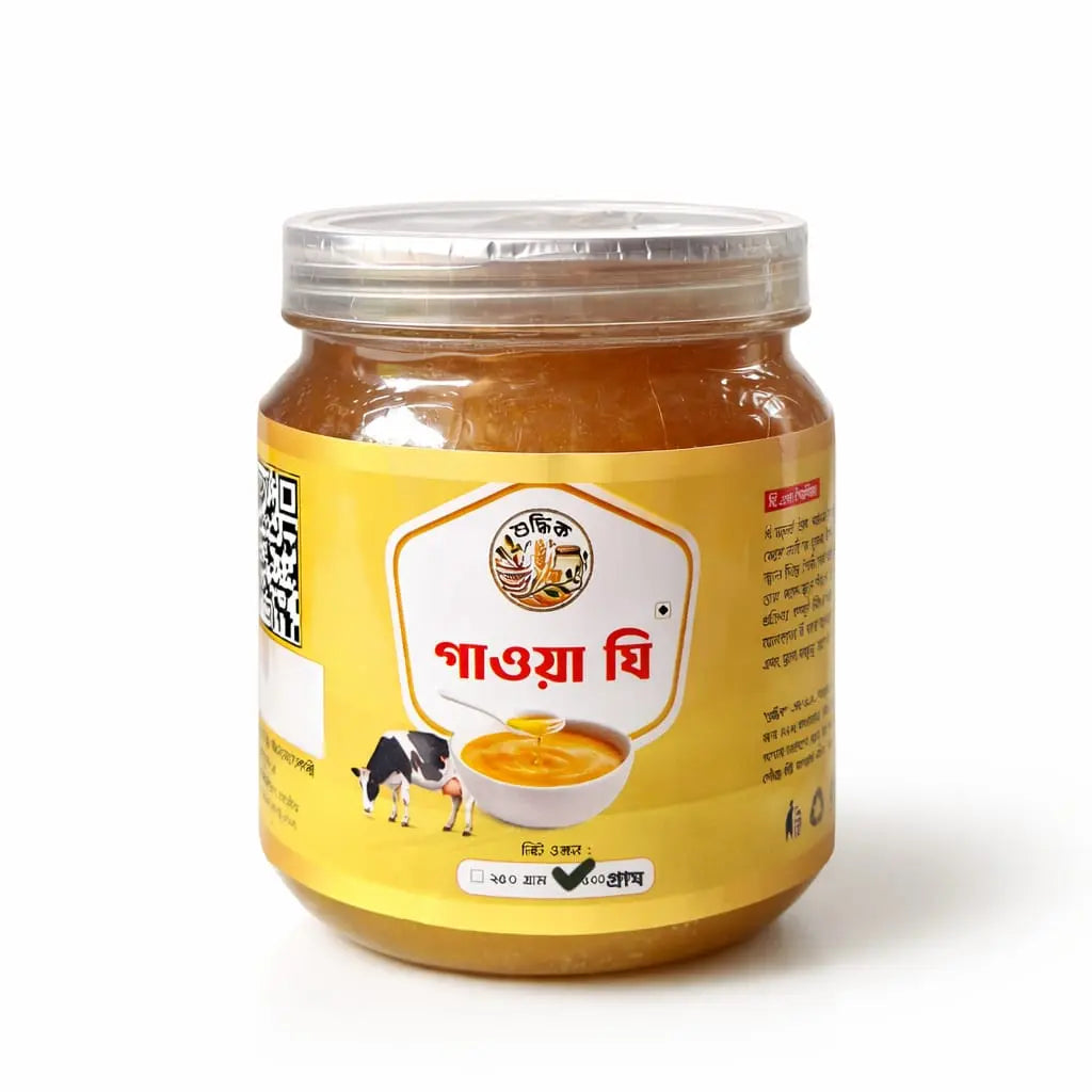 Jar of Shudhik pure gawa ghee with a clear label, showcasing the golden, creamy ghee inside a glass container.