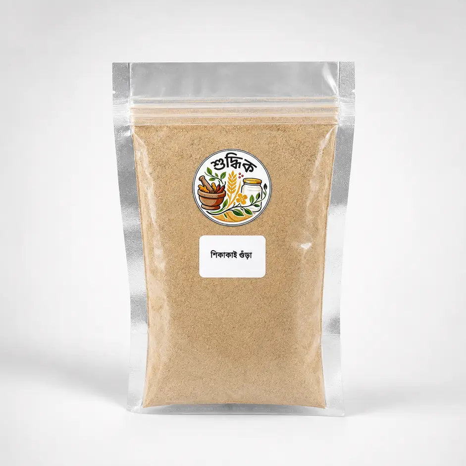 Shudhik Shikakai powder, natural herbal hair care product, shown in a clear container, ideal for traditional hair cleansing.