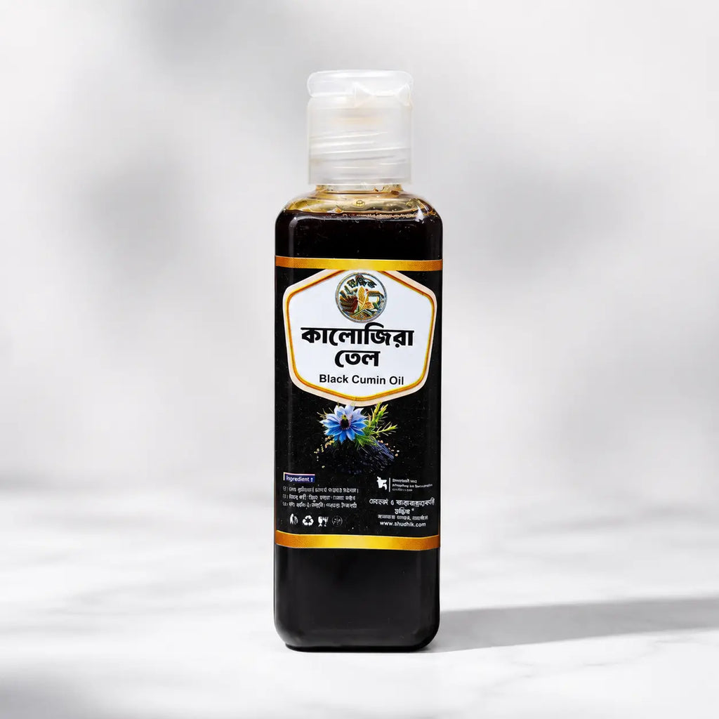 Shudhik Black Seed Oil in a 100ml bottle, natural oil & ghee product with dark amber liquid, ideal for health and wellness.