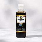 Shudhik Black Seed Oil in a 100ml bottle, natural oil & ghee product with dark amber liquid, ideal for health and wellness.