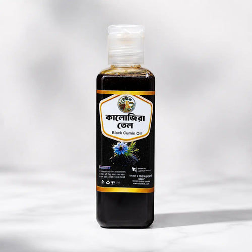 Shudhik Black Seed Oil in a 100ml bottle, natural oil & ghee product with dark amber liquid, ideal for health and wellness.
