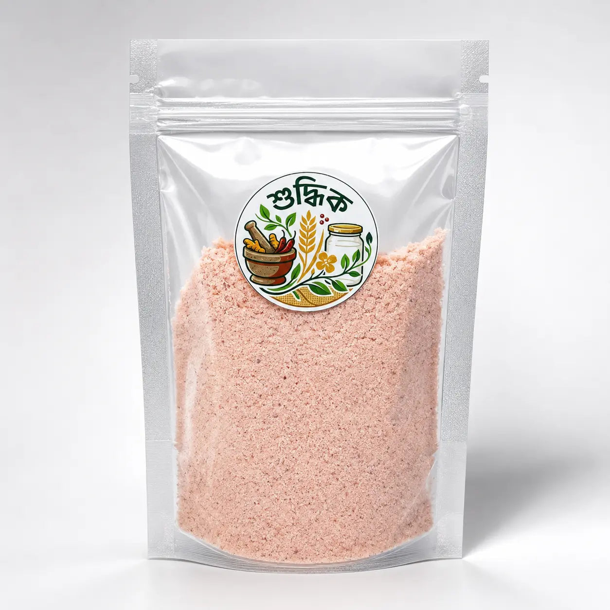 Pink Shudhik salt crystals in a clear container, showcasing vibrant pink Himalayan salt for culinary use.