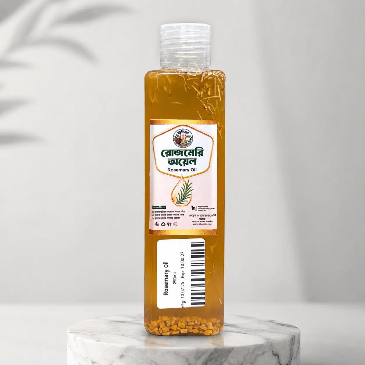 Shudhik rosemary oil for hair care in a 250ml bottle, natural herbal hair treatment with fresh rosemary leaves visible.