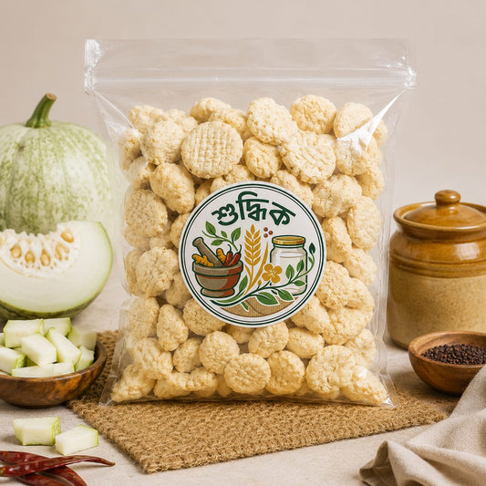 Traditional Bengali Kumro Bori by Shudhik, handcrafted pumpkin seed dumplings from premium rice flour, traditional Bengali food.