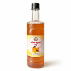 Pure Mustard Honey from Shudhik, showcasing a 1kg jar of golden honey extracted from mustard flowers.