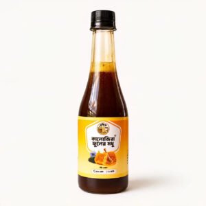 Pure Black Seed Honey from Shudhik, raw honey made from kalojira flowers, 500g jar with dark, thick honey inside.