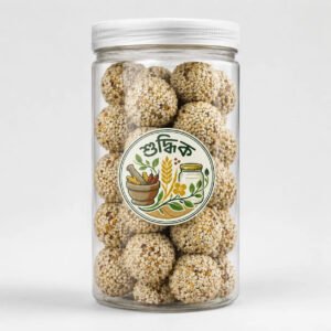 Shudhik Premium Biotin Laddu superfood in jar with sesame and nuts, natural healthy snack with rich ingredients.